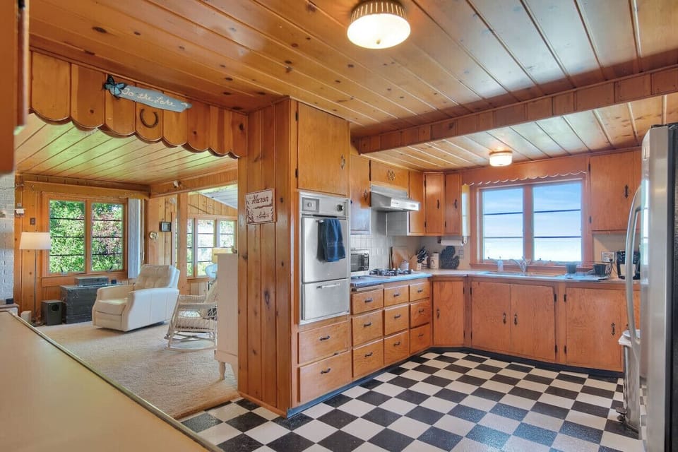 The kitchen is just outside the living room