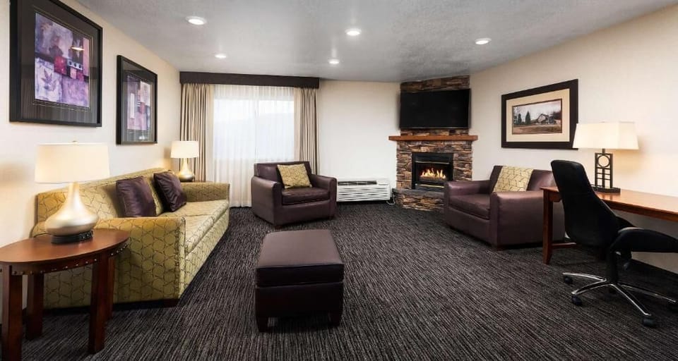 Gather by the fireplace for cozy evenings and easy conversation.