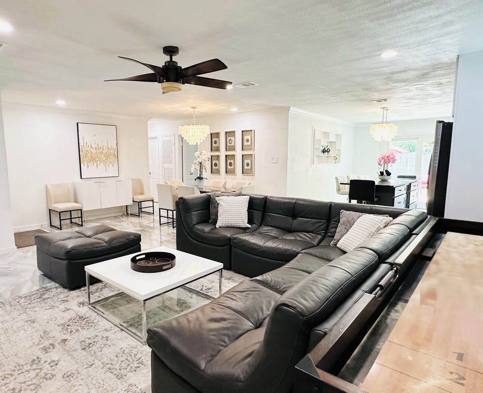 Our living room with open concept with many seating arrangement for everyone.