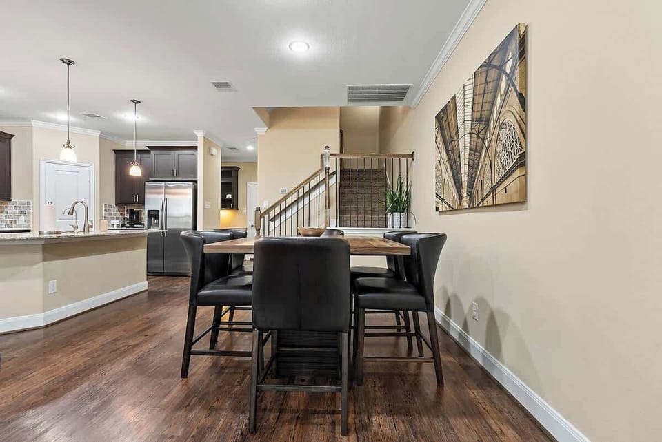 Embrace the flow of our dining room, where the kitchen and dining table blend effortlessly. Whether you're cooking or dining, savor the perfect togetherness in this welcoming space.