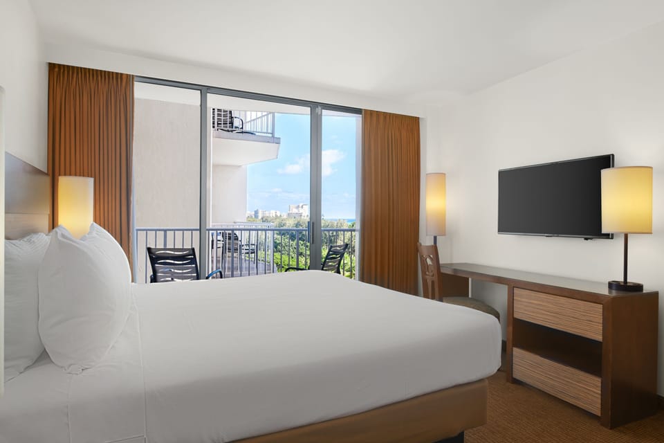 Settle in comfortably with bright views and a spacious work desk.