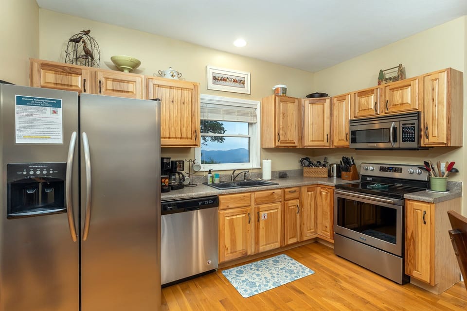 Kitchen with dishwasher, drip-style coffee maker, and Keurig-style coffee maker