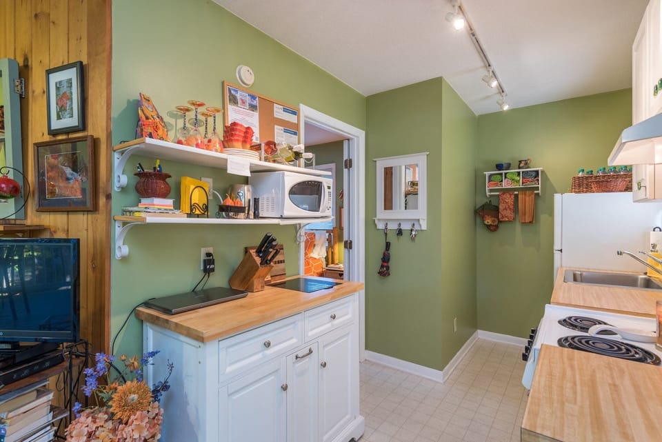 Kitchen. Note: Keurig pictured is no longer at the home & has been replaced by a standard Drip-Style coffeemaker. There is no dishwasher.