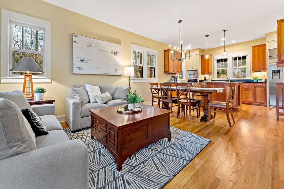 Family room with a gas logs fireplace & 43" Smart TV with streaming only.