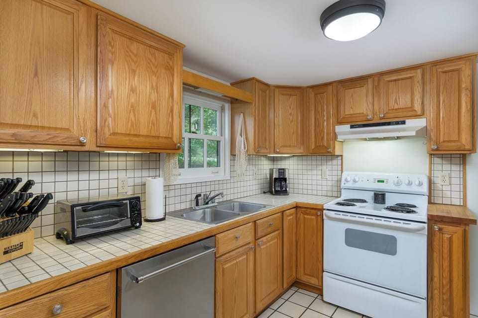 Whip up delicious meals in the kitchen complete with dishwasher & standard drip coffeemaker.