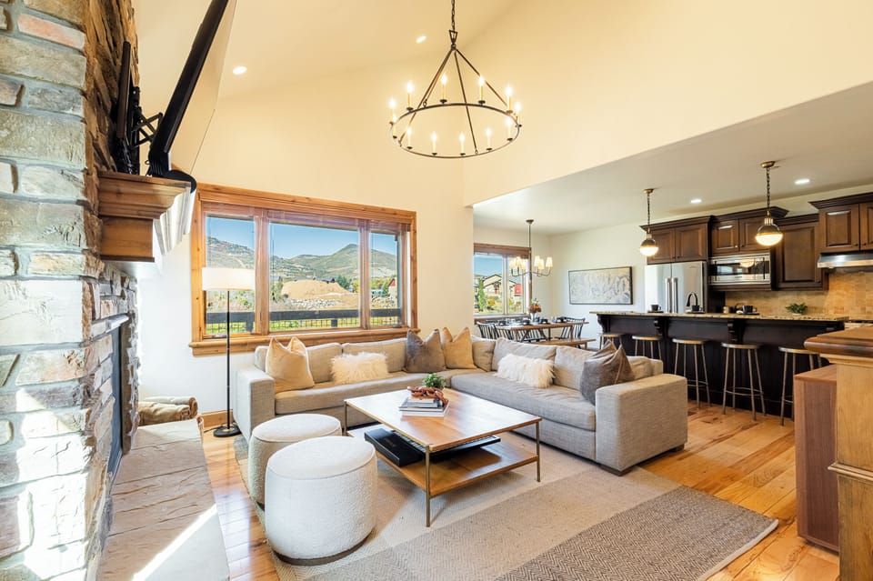 Main level great room with hardwood floors and mountain views