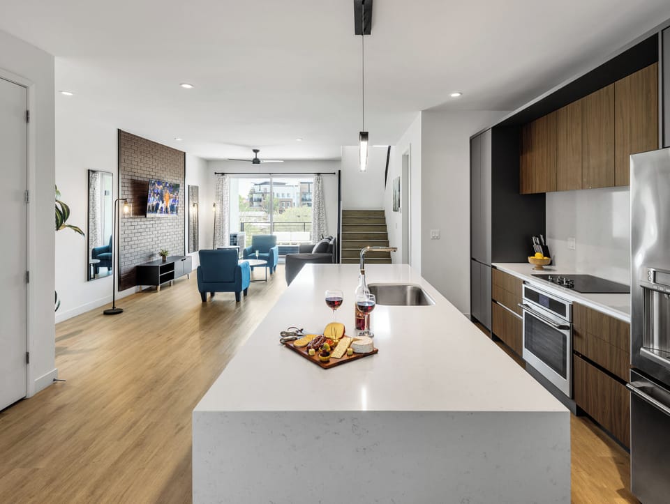 1st Floor: Fully equipped modern kitchen completely stocked with all culinary essentials and includes high-end Cafe stainless steel appliances.