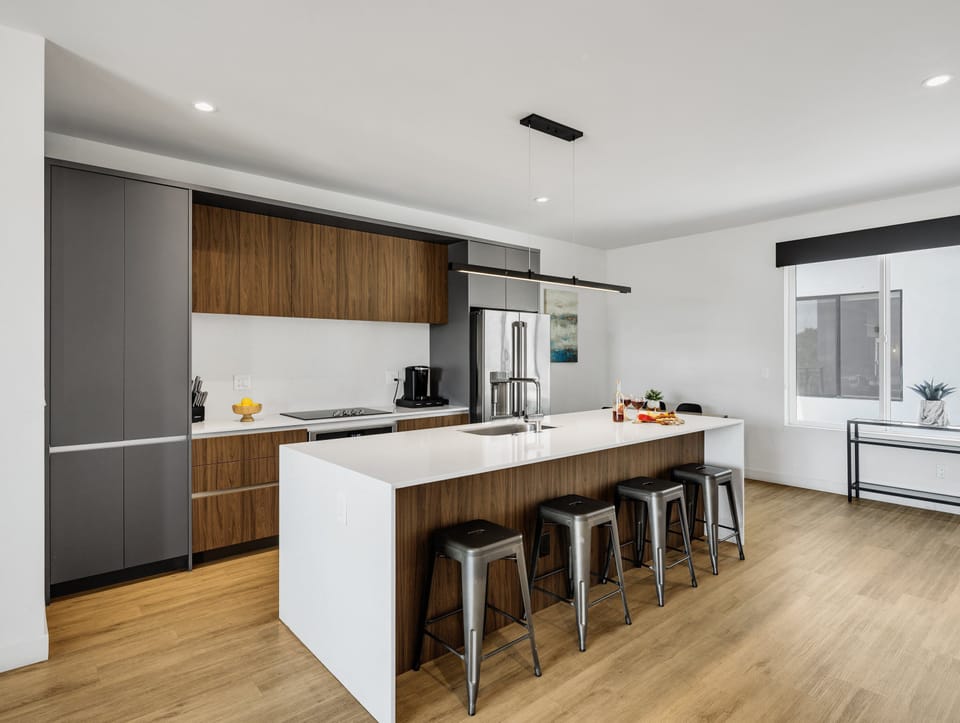 1st Floor: Fully equipped modern kitchen completely stocked with all culinary essentials and includes high-end Cafe stainless steel appliances.