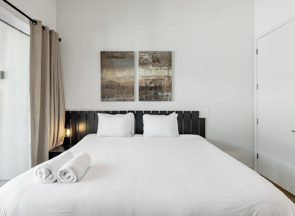 2nd Floor: 2nd Bedroom featuring a King Bed, a Smart TV, a Private Balcony, and an ensuite bathroom.