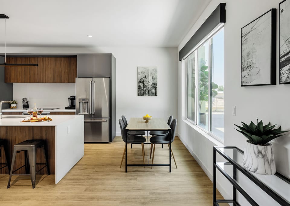 1st Floor: Fully equipped modern kitchen completely stocked with all culinary essentials and includes high-end Cafe stainless steel appliances. Dining table offers a space for four.