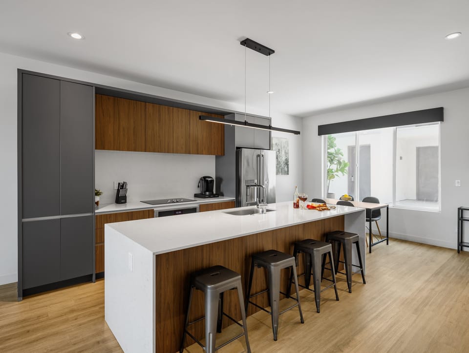 1st Floor: Fully equipped modern kitchen completely stocked with all culinary essentials and includes high-end Cafe stainless steel appliances.