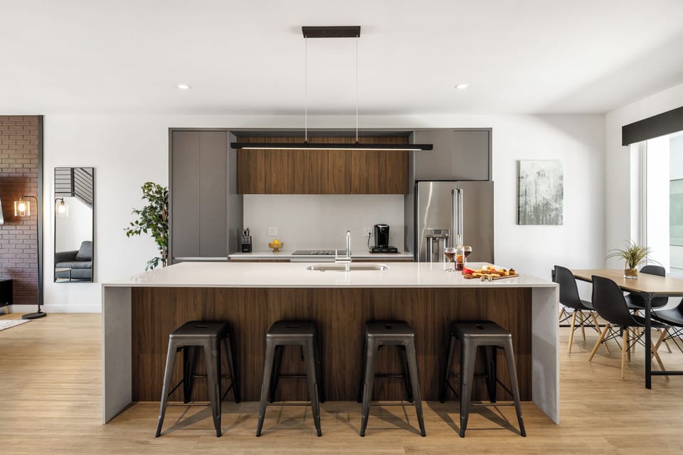 1st Floor: Fully equipped modern kitchen completely stocked with all culinary essentials and includes high-end Cafe stainless steel appliances.