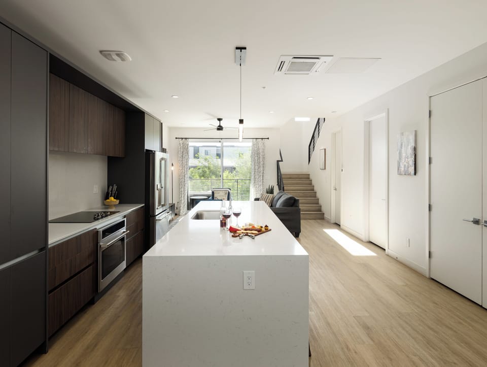 1st Floor: Fully equipped modern kitchen completely stocked with all culinary essentials and includes high-end Cafe stainless steel appliances.