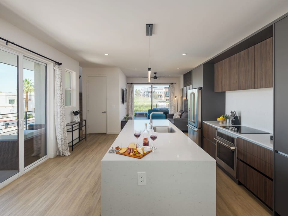 1st Floor: Fully equipped modern kitchen completely stocked with all culinary essentials and includes high-end Cafe stainless steel appliances.