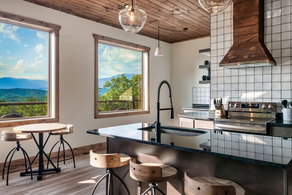 This fully stocked kitchen has everything you need, spacious counters, modern touches, and that warm cabin feel set the stage for unforgettable family gatherings.