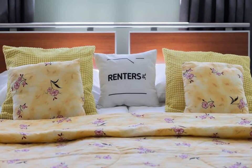 The bedroom's modern design ensures a comfortable stay. 