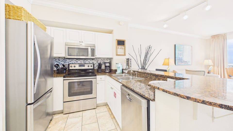 Full kitchen with all the cooking essentials and breakfast bar