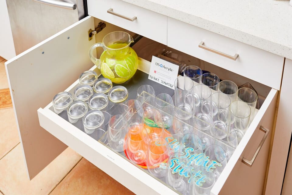There are acrylic `glasses` we`ve provided for you to use on the pool deck. You can find them in the cabinet on the right side of the dishwasher, on the top shelf. They are dishwasher-safe in the top rack.