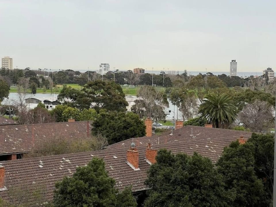 Views from the balcony overlook the nearby parkland.