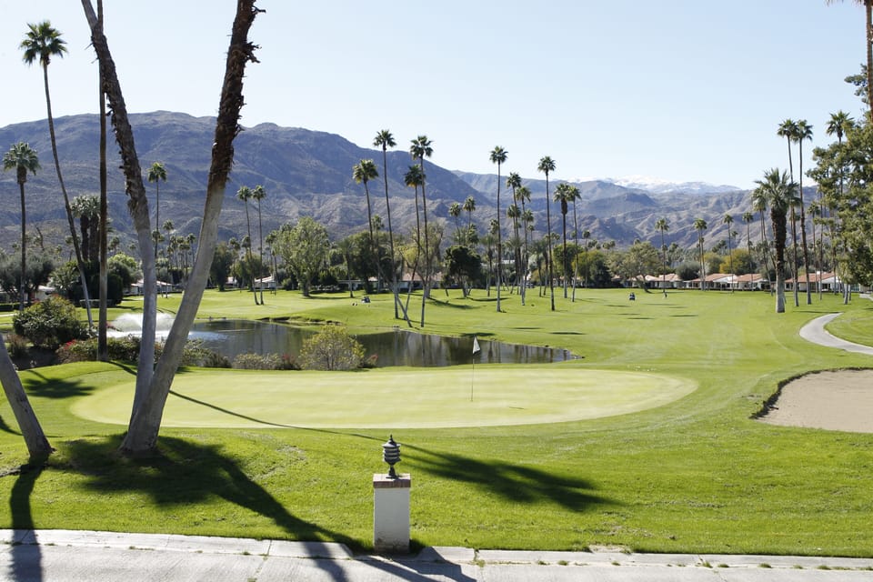 Condo is located on Rancho Las Palmas golf course.