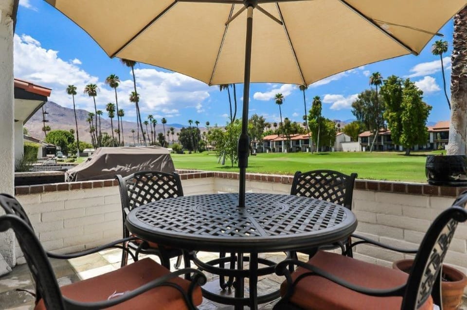 Expansive patio with big mountain and golf course views. 
