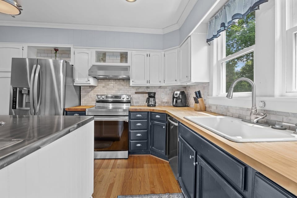 Modern kitchen featuring sleek stainless-steel appliances