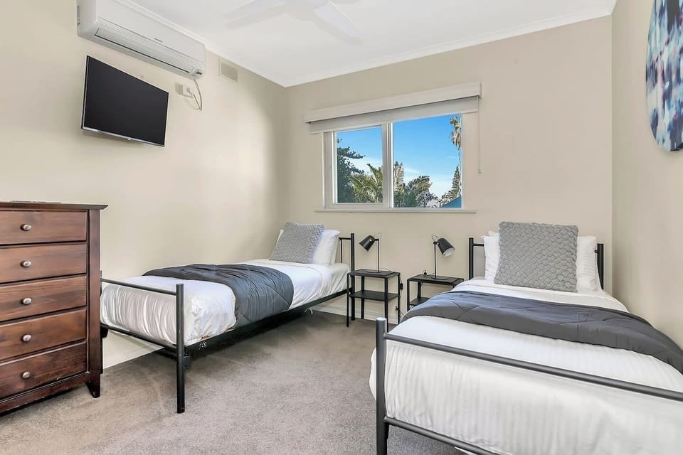The kids can chill out in their own beds and watch a movie in the second bedroom. 
