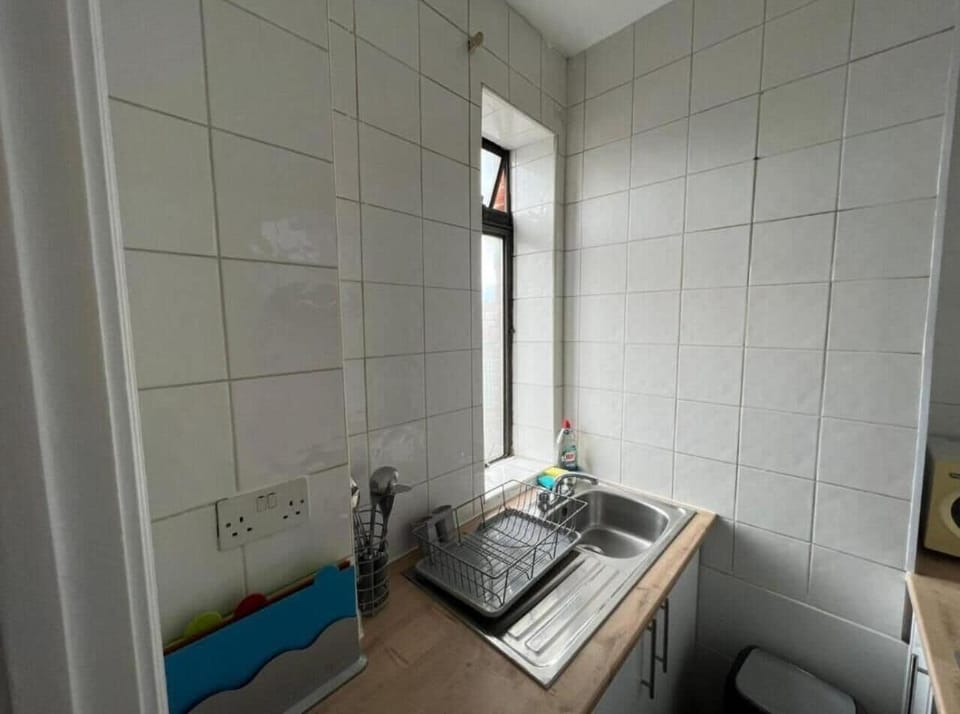 This photo represents the kitchen inside the flat. 