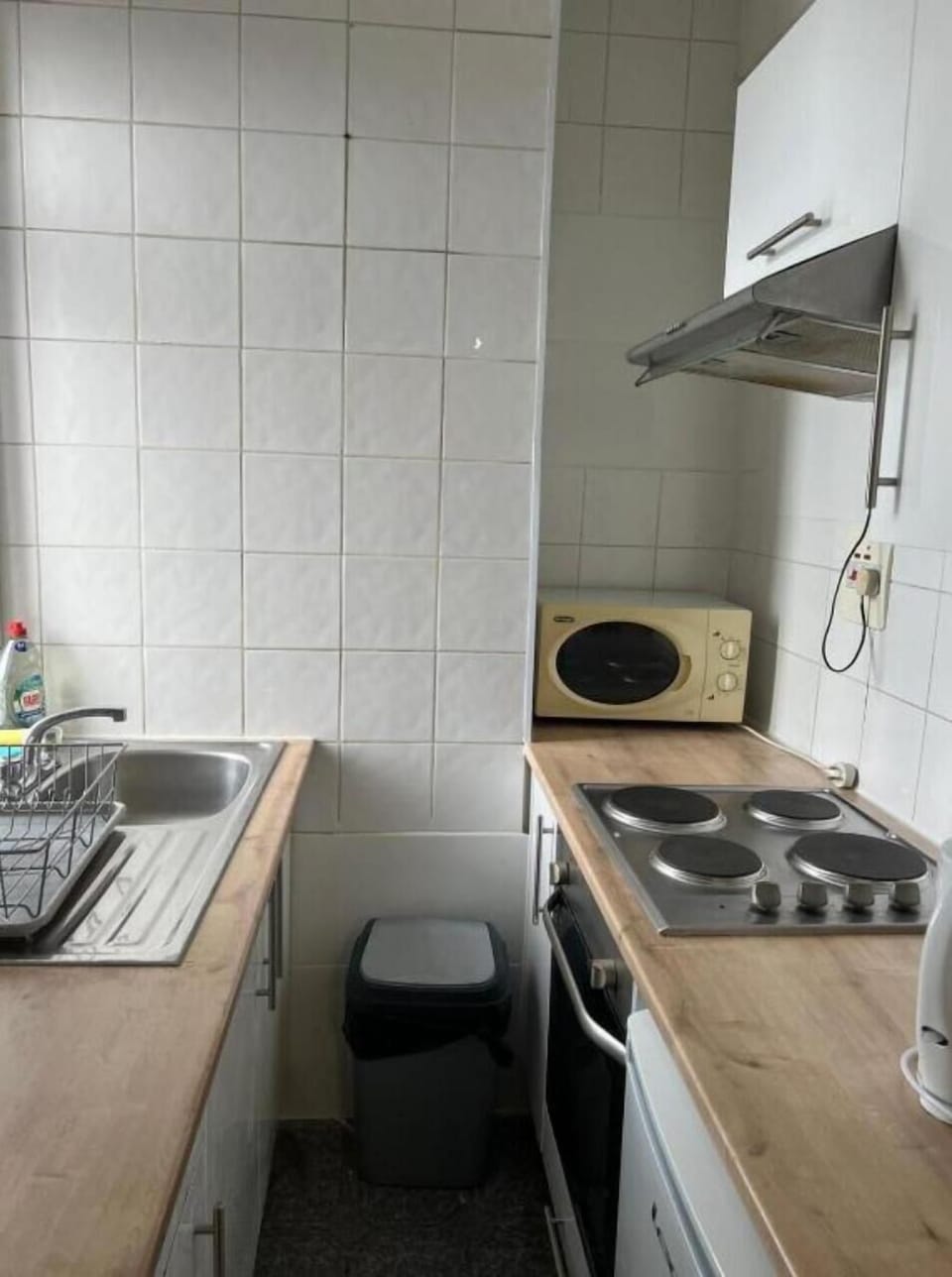 This photo represents the kitchen inside the flat. 
