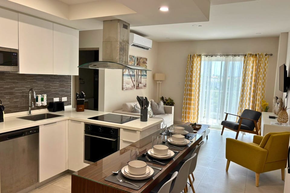 Adjacent to the living area, discover your  kitchen