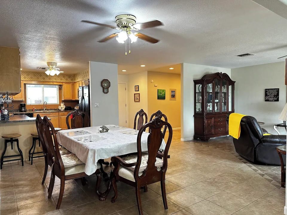 Open-Concept Dining & Living room off the kitchen, front door entrance and hall