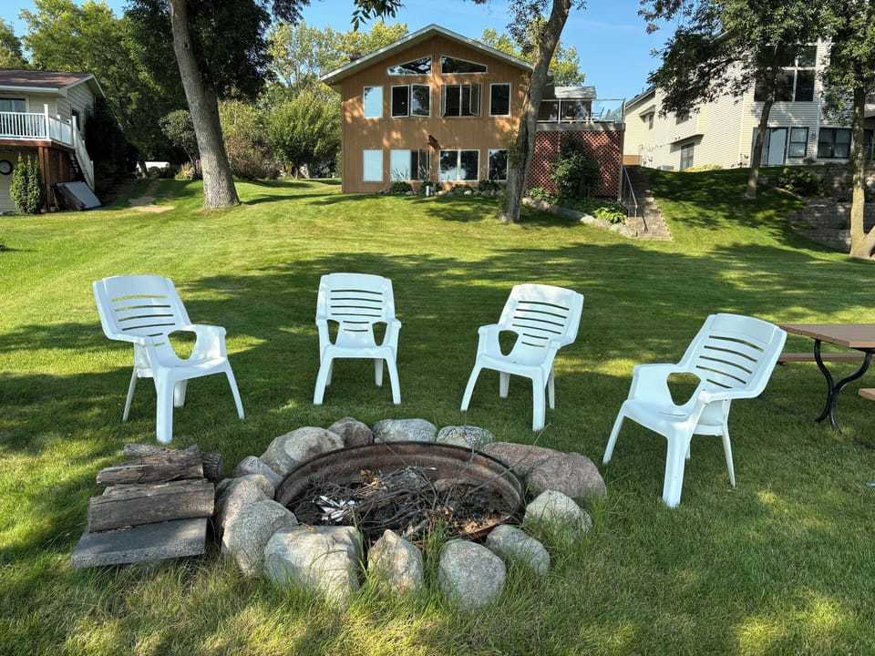 Great lakeside fire pit, picnic table, and flat yard for games!