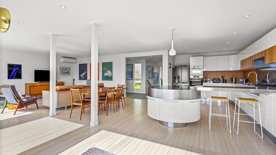Modern, fully equipped kitchen, dining and living room