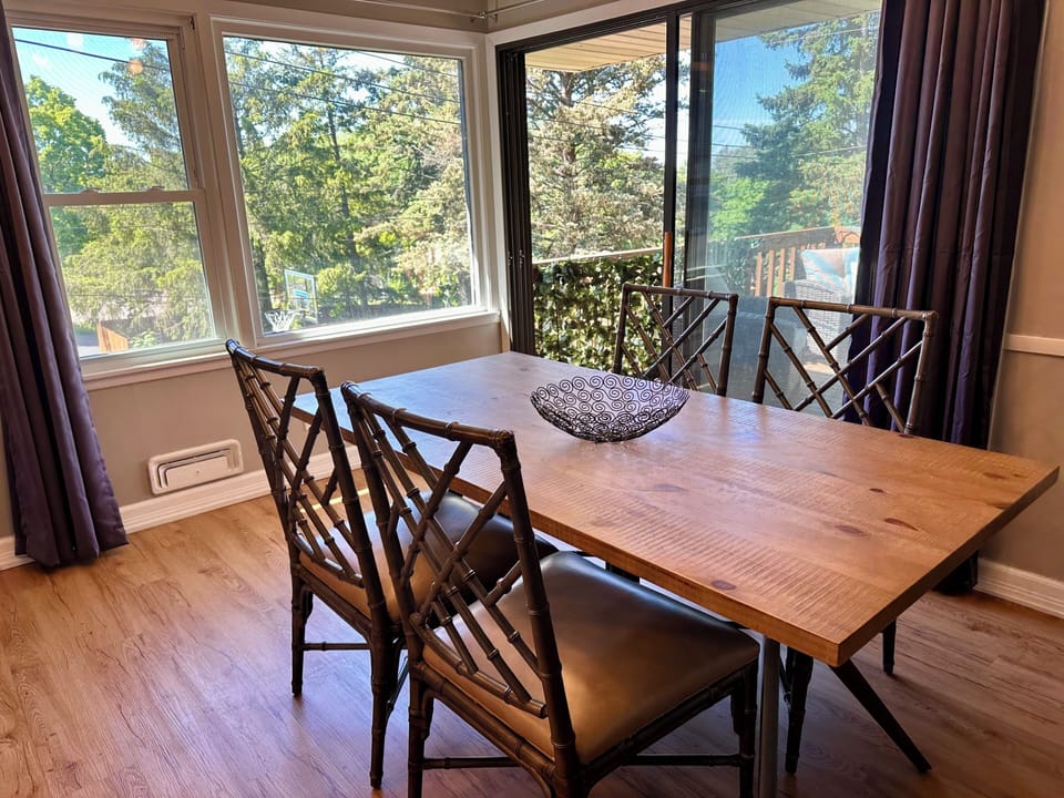 Dining room open to kitchen and deck
