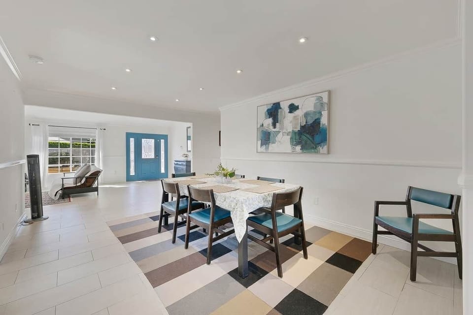 Dining room that seats 6 adults comfortably. Open floor plan, light and bright