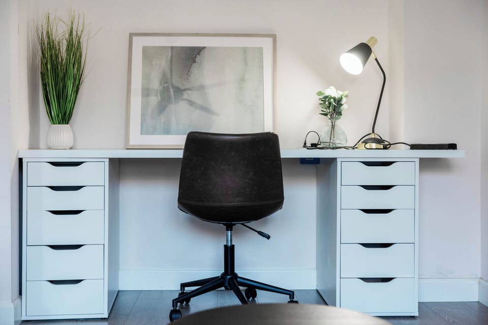 Generous desk space for work/creative space