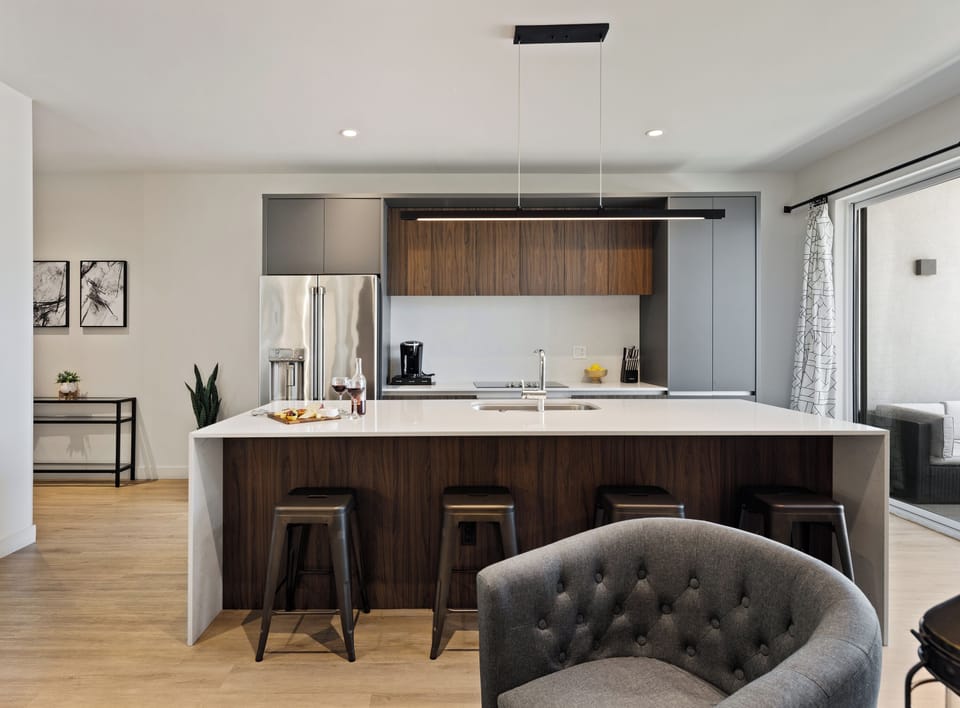 Unit 1 - 1st Floor: Fully equipped modern kitchen completely stocked with all culinary essentials and includes high-end Cafe stainless steel appliances.