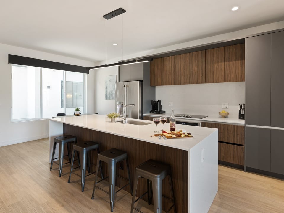 Unit 2 - 1st Floor: Fully equipped modern kitchen completely stocked with all culinary essentials and includes high-end Cafe stainless steel appliances.