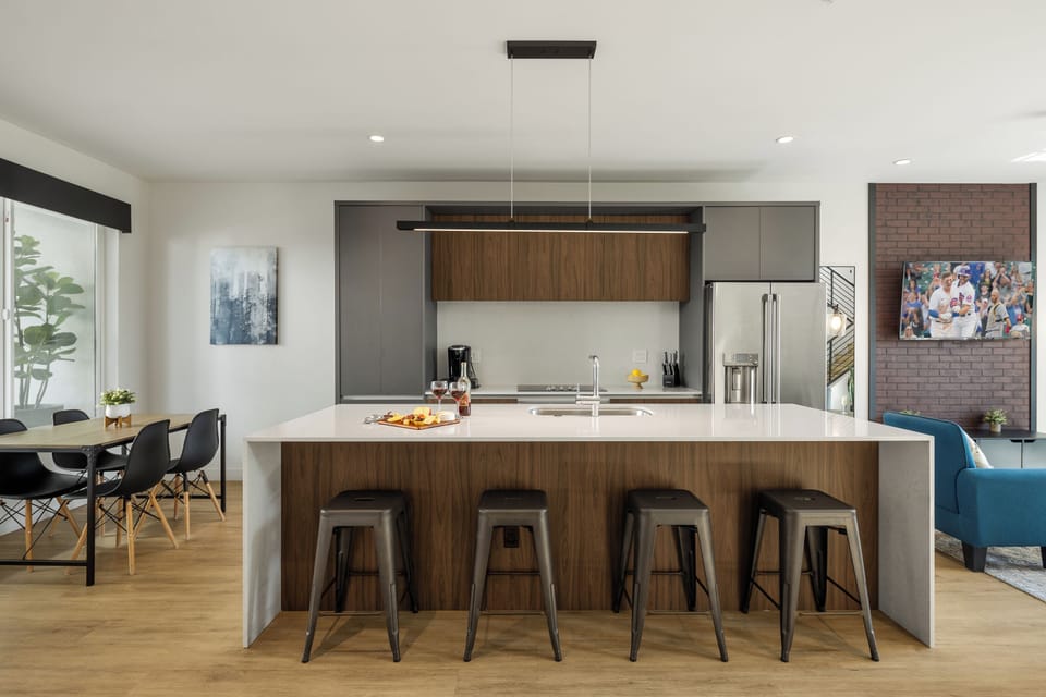 Unit 1 - 1st Floor: Fully equipped modern kitchen completely stocked with all culinary essentials and includes high-end Cafe stainless steel appliances.