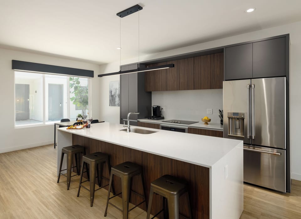 Unit 2 - 1st Floor: Fully equipped modern kitchen completely stocked with all culinary essentials and includes high-end Cafe stainless steel appliances.