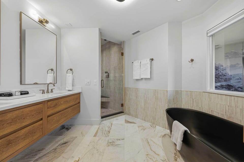 Primary en suite bathroom, shower, soaking tub and double vanity