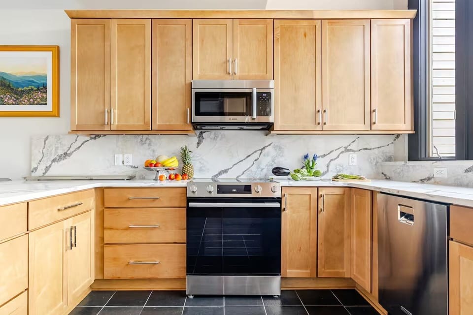 Have a drink and snack at the kitchen counter bar, looking out onto incredible 20-mile views
