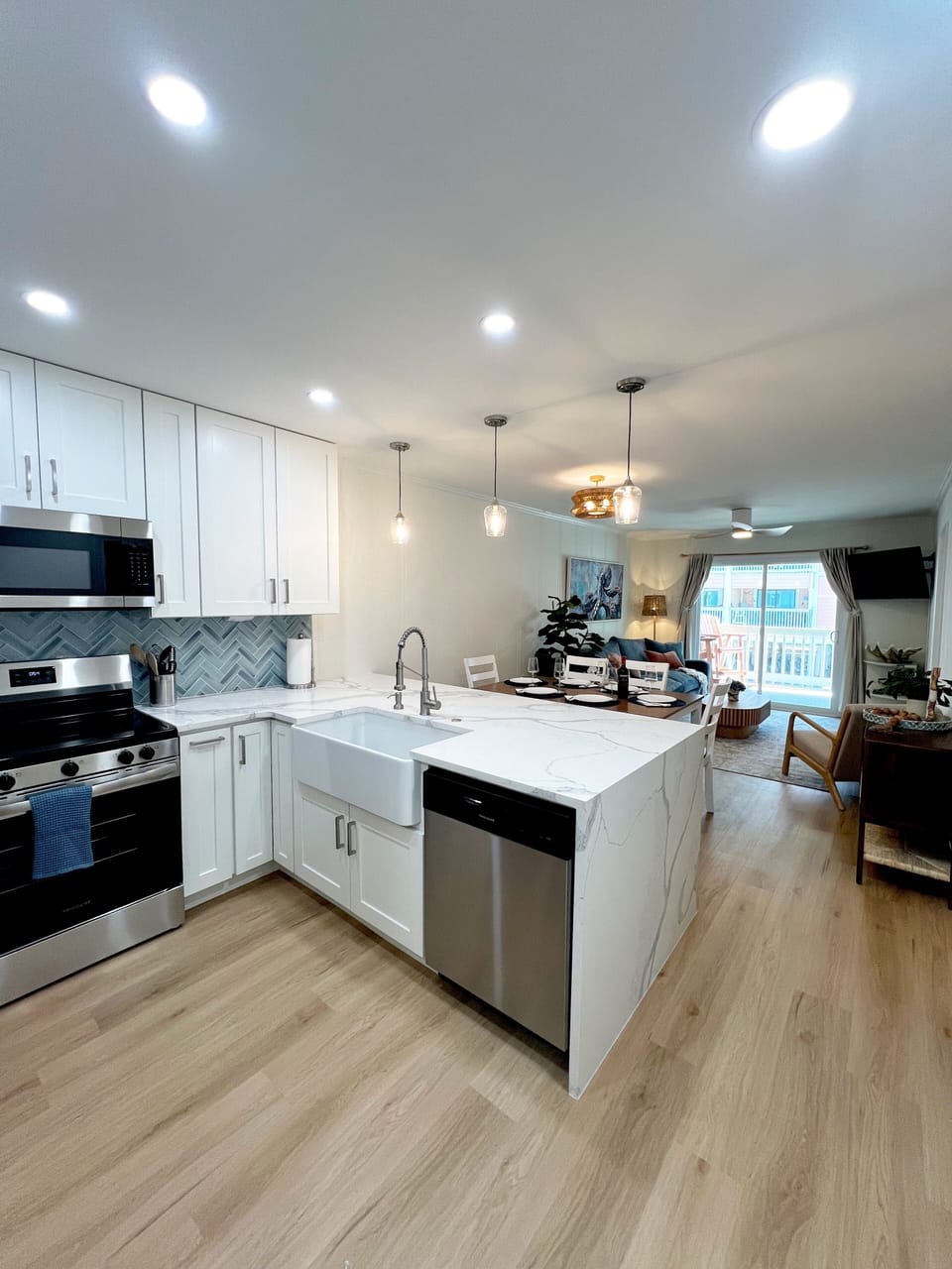 Beautifully renovated kitchen with farmhouse style sink