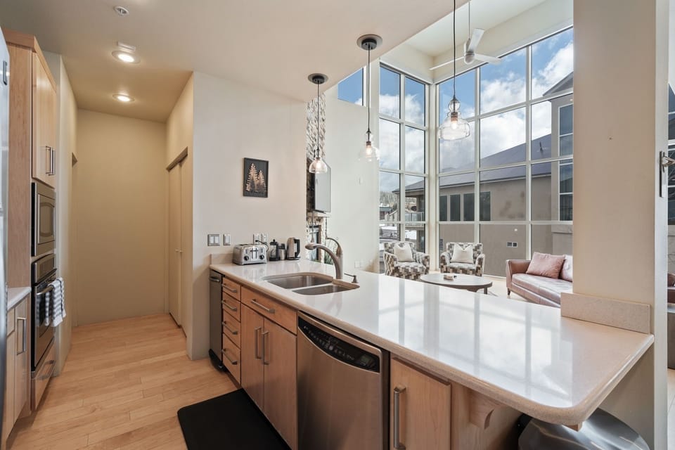 The kitchen boasts a dishwasher and plenty of space for all your cooking needs! | The Hillside, Brian Head, Utah | Voyax Luxury Vacation Rentals