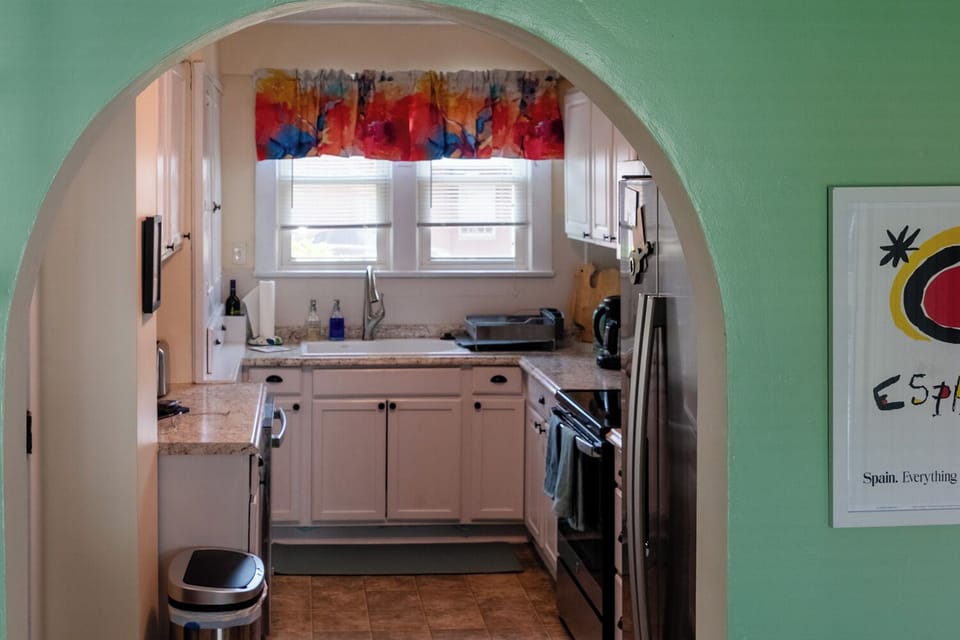 Fully equipped kitchen with new stainless steel appliances.
