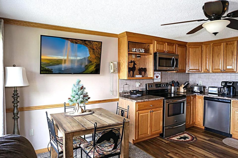 The table for four is an ideal place to gather for meals.