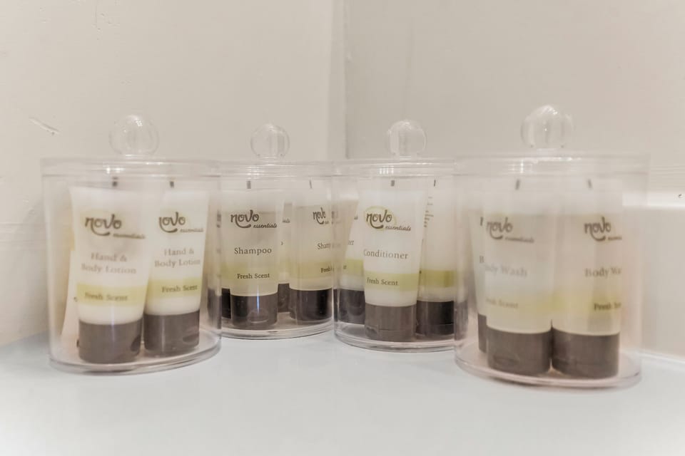 Fully stocked shampoo, conditioner, body wash, and lotion for your use