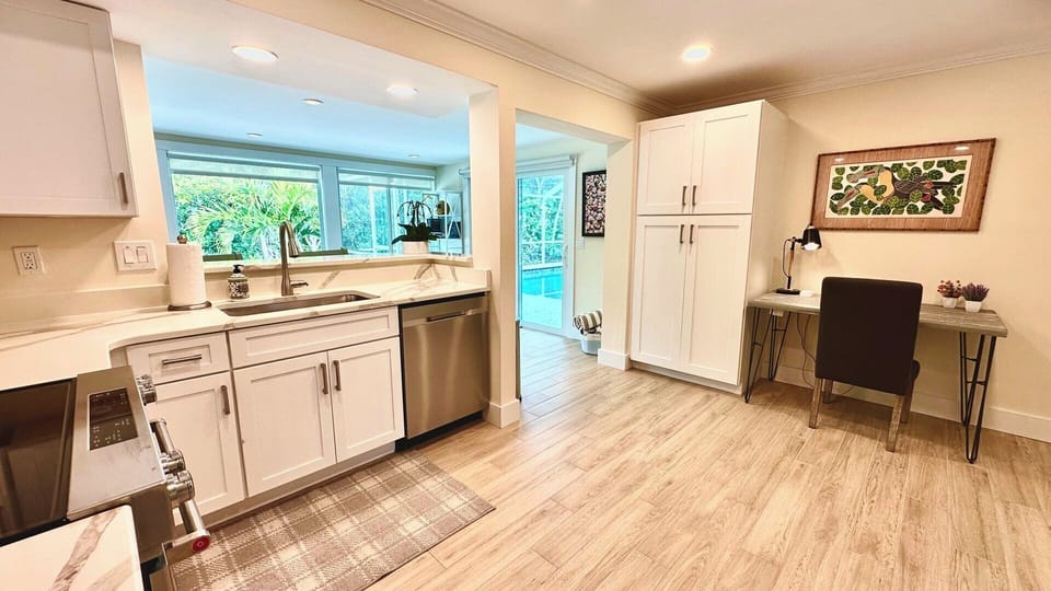 Kitchen pantry and desk.
