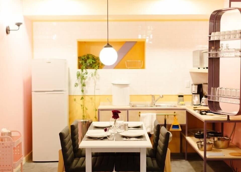 Cozy dining room with kitchen