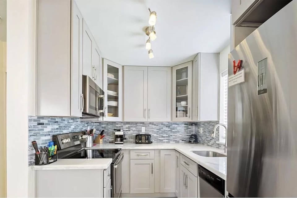 The kitchen at Castaway Cove features abundant counter space, providing ample room for preparing meals and gathering with loved ones.